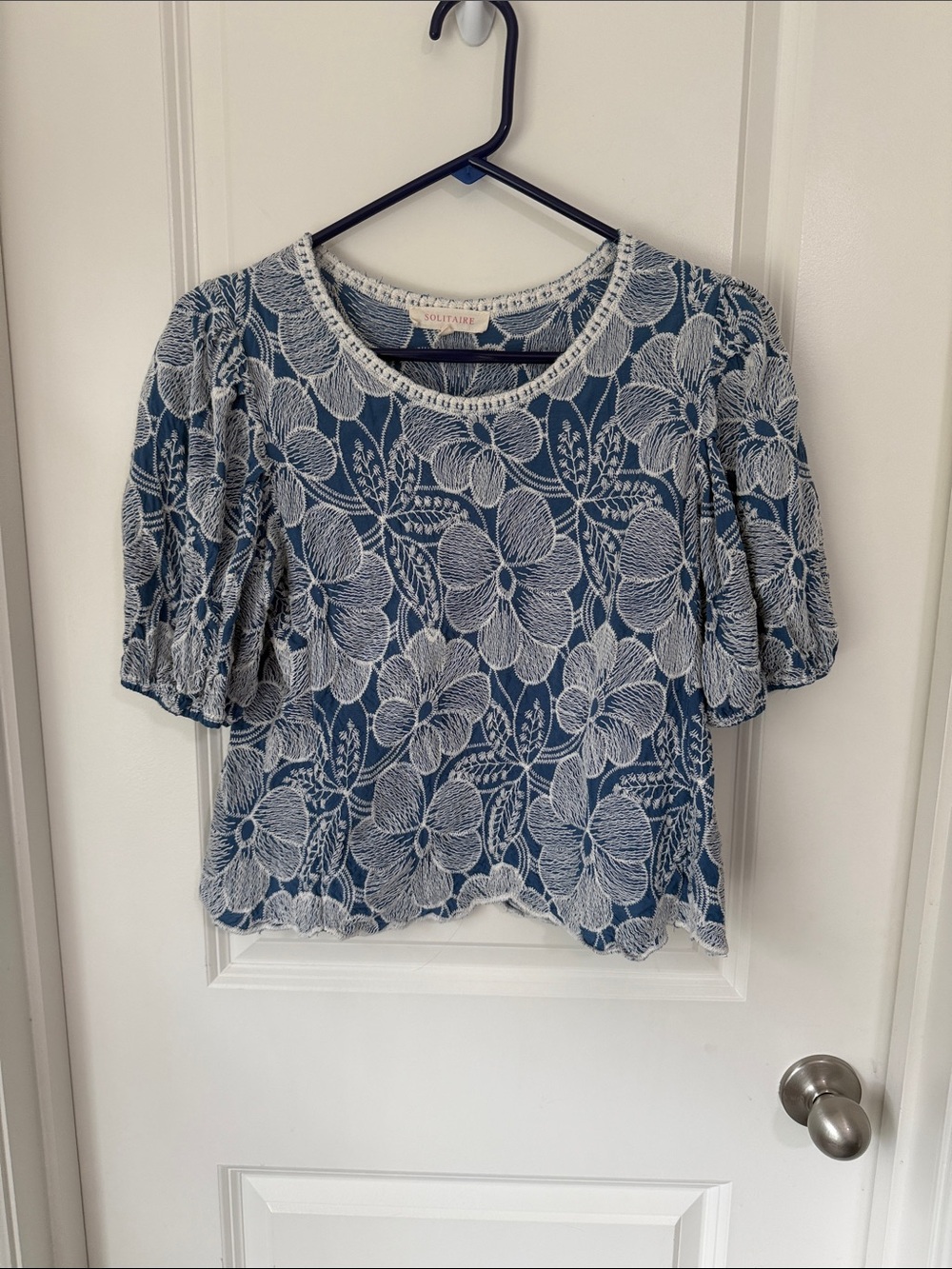 Blue and white lace top